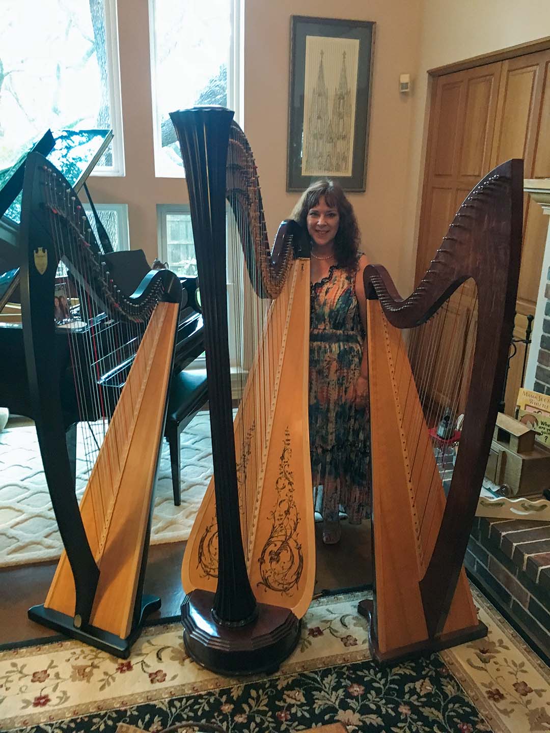 Sherri Stricker Displaying Her Harps